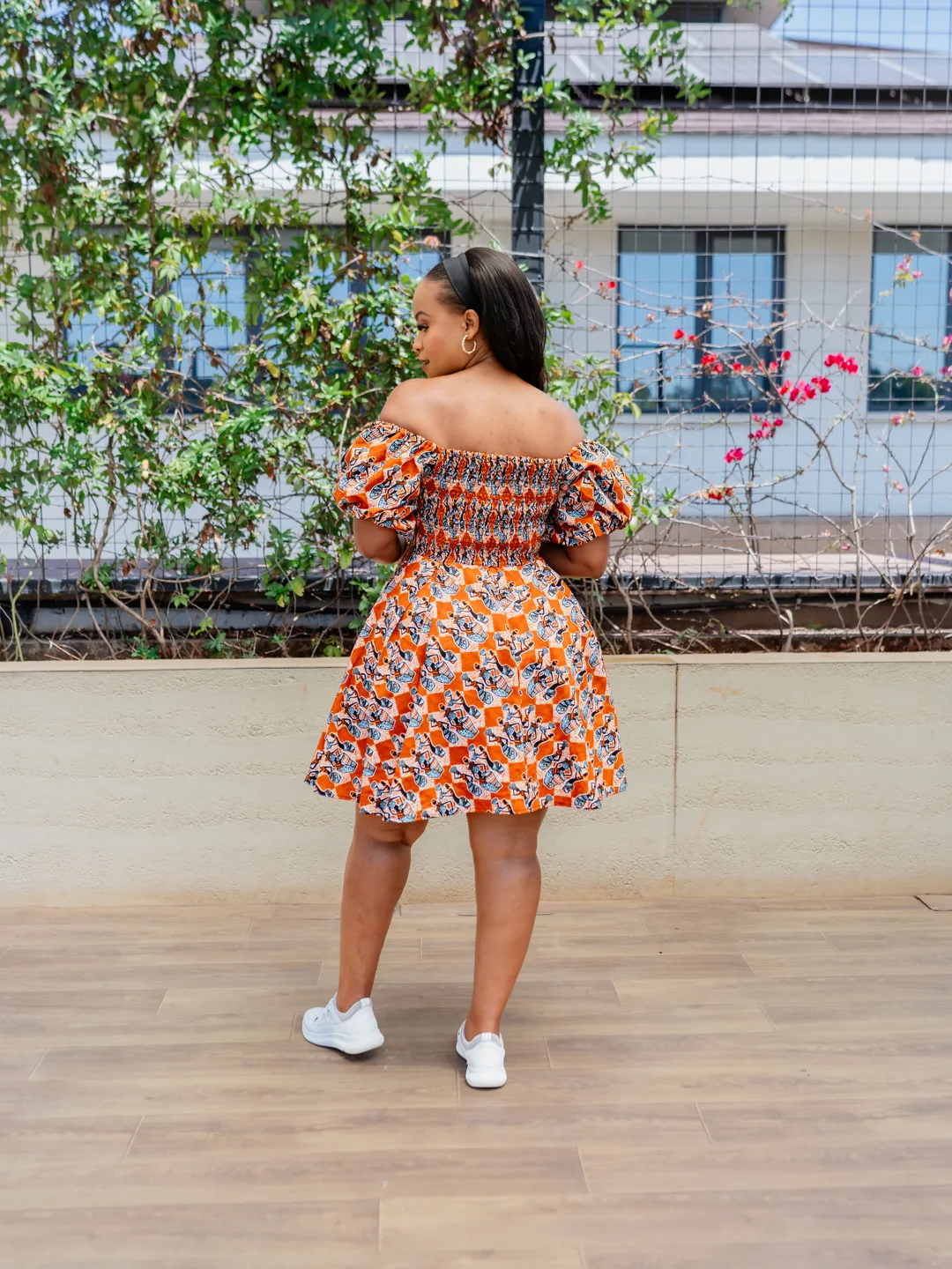 Doll Dress 2.0 — Marigold, off-shoulder puff-sleeve fit-and-flare mini dress, orange and blue geometric print